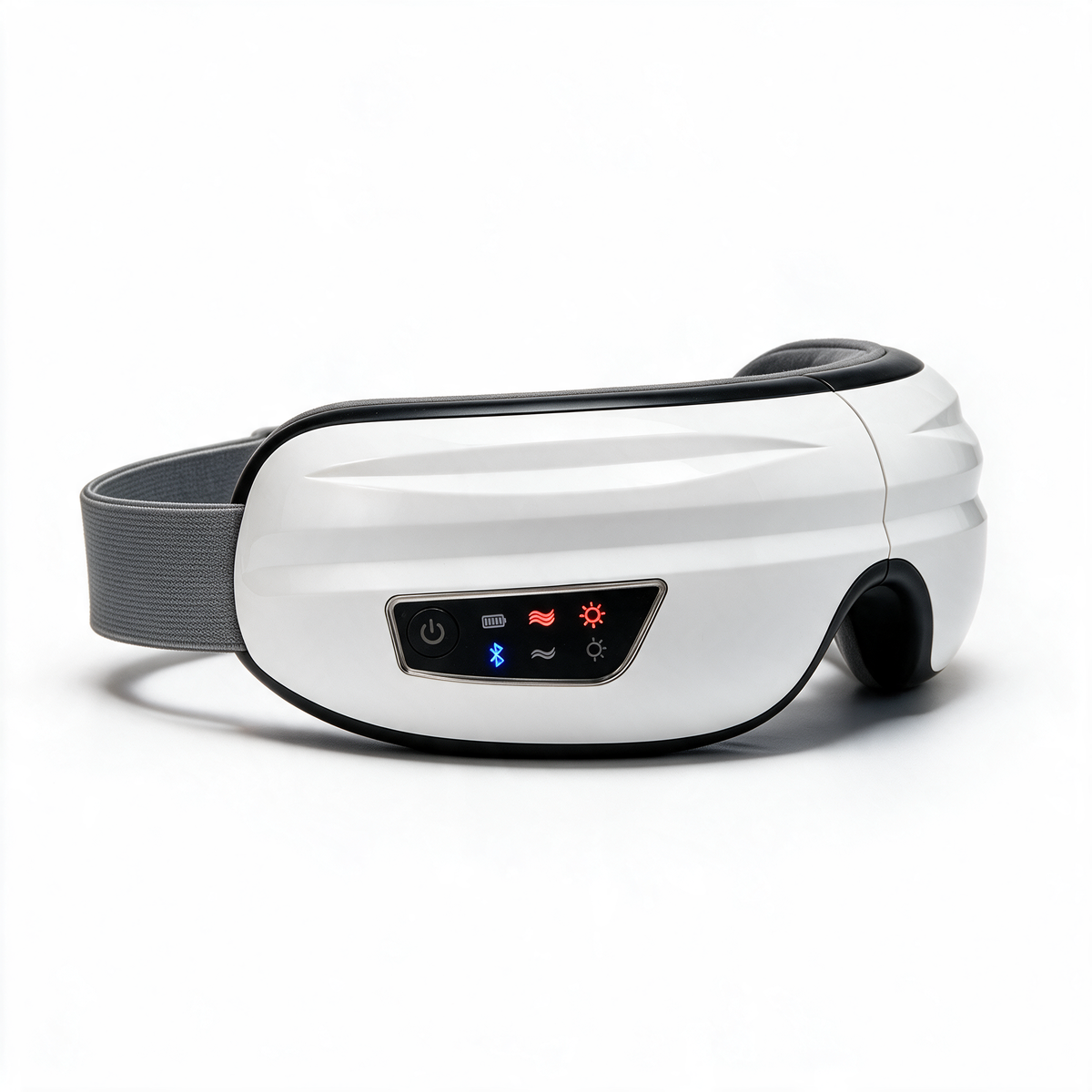 The white Nove Body Heated Eye Massager at a three-quarter angle, its heat, massage and Bluetooth lights on